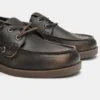 Abgetragene Schuhe mit Schnürung Abgetragene Schuhe mit Schnürung