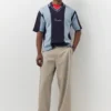 Besticktes gestreiftes Strick-Poloshirt