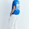 Blaues T-Shirt mit Grafik und Slogan Blaues T-Shirt mit Grafik und Slogan
