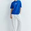Blaues T-Shirt mit Grafik und Slogan Blaues T-Shirt mit Grafik und Slogan