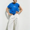 Blaues T-Shirt mit Grafik und Slogan Blaues T-Shirt mit Grafik und Slogan