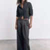 Geknöpfte Strickjacke Geknöpfte Strickjacke