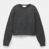 Geknöpfte Strickjacke Geknöpfte Strickjacke