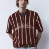 Gestreiftes Strick-Poloshirt mit Reißverschluss