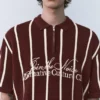 Gestreiftes Strick-Poloshirt mit Reißverschluss