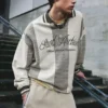 Gestreiftes STWD-Football-Poloshirt