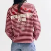 Gestreiftes T-Shirt mit Sternen und Slogan Gestreiftes T-Shirt mit Sternen und Slogan