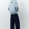 Hoodie mit Aufnähern und Reißverschluss