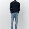 Jeans im Karotten-Schnitt mit Farbspritzern