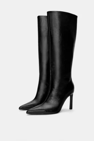 Kniehohe Stiefel mit hohem Absatz