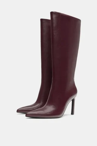 Kniehohe Stiefel mit hohem Absatz