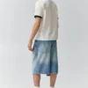 Kurzarm-T-Shirt mit grafischem Bündchen Kurzarm-T-Shirt mit grafischem Bündchen