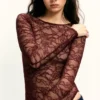 Langärmeliger Body mit Spitze Langärmeliger Body mit Spitze