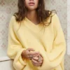 Oversize-Pullover mit asymmetrischem Saum Oversize-Pullover mit asymmetrischem Saum