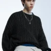 Pullover mit Zopfmuster und Acid-Wash-Effekt