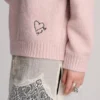 Rosa Pullover mit gesticktem Herz Rosa Pullover mit gesticktem Herz