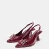 Schuhe mit Absatz und Schnallen