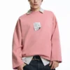 Sweatshirt mit rosa Label Sweatshirt mit rosa Label