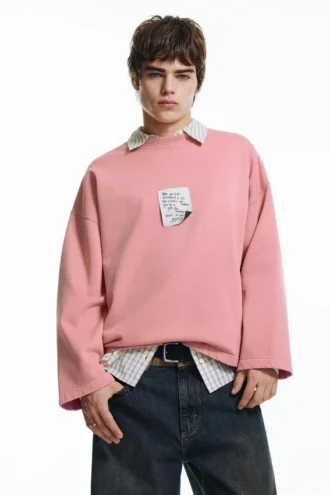 Sweatshirt mit rosa Label