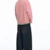 Sweatshirt mit rosa Label Sweatshirt mit rosa Label