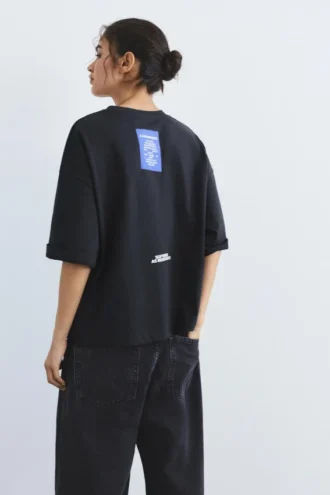 T-Shirt mit gesticktem Slogan-Etikett