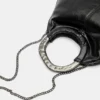 Tasche mit Metallgriff Tasche mit Metallgriff