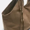 Tote-Tasche aus Kunstleder mit Riemendetails Tote-Tasche aus Kunstleder mit Riemendetails