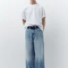 Weite Jeans mit Sternenprint Weite Jeans mit Sternenprint