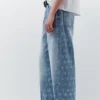 Weite Jeans mit Sternenprint Weite Jeans mit Sternenprint