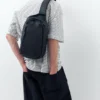 XL-Gürteltasche aus gummiertem Stoff XL-Gürteltasche aus gummiertem Stoff
